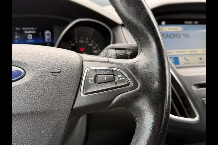 Ford FOCUS Wagon 1.0 Titanium 2e Eigenaar,125pk,Navi,Trekhaak,Stuurverwarming,Stoelverwarming,6 Bak,Pdc,Lmv,Apk tot 04-2026