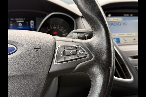 Ford FOCUS Wagon 1.0 Titanium 2e Eigenaar,125pk,Navi,Trekhaak,Stuurverwarming,Stoelverwarming,6 Bak,Pdc,Lmv,Apk tot 04-2026