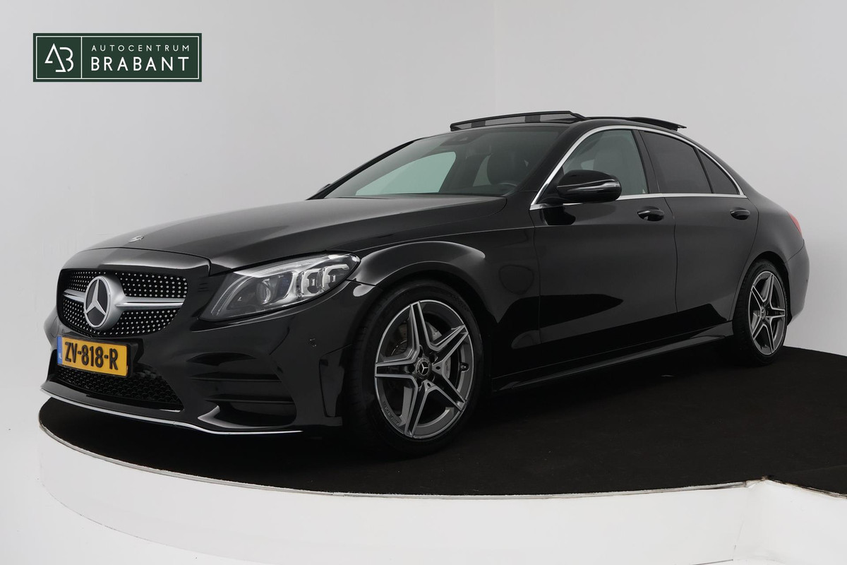 Mercedes-Benz C-Klasse 200 Business Solution AMG (PANORAMADAK, SFEERVERLICHTING, NAVIGATIE, CAMERA, STOELVERWARMING)