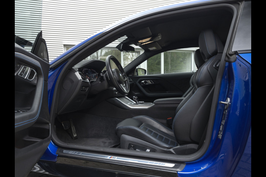 BMW 2 Serie Coupé M240i xDrive - M-Sportzetels - Bilstein EVO SE - Head-Up - Harman Kardon