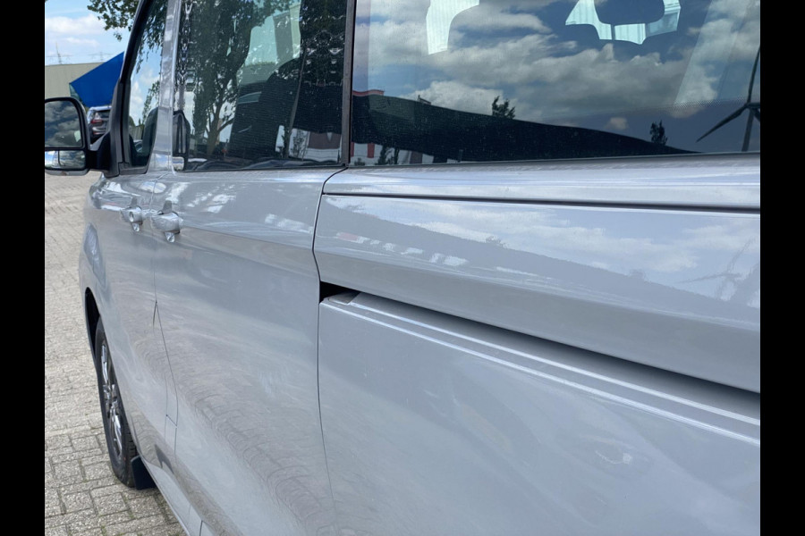 Ford Transit Custom 340 2.5 PHEV L2H1 Limited 233pk Zuid |  Kombi | Incl. BTW/BPM | Dubbele zijschuifdeur | Privacy Glass | Inklapbare trekhaak | 17 inch lichtmetalen velgen | Driver Assistance Pack Premium | Verwarmbaar stuurwiel