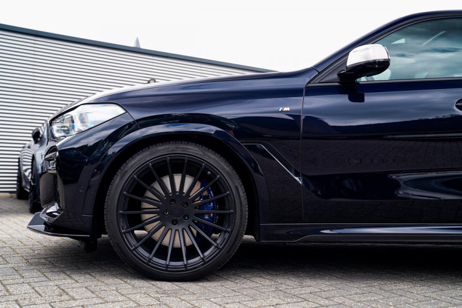 BMW X6 M50i High Executive | Carbon inleg | Krystallen Pook | Harman/Kardon | X6M look | 360 | Uitlaatklep | BMW Drive Assisted |
