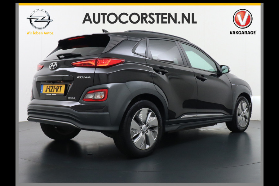 Hyundai Kona EV 64kWh 204pk Leer Schuif/Kanteldak 3 Fase laden Warmtepomp Apple Carplay Android Navi Camera Elektr.Stoelen+Verwarmd+Ventilati Pdc Elektr.Stoelen+Verwarmd+Ventilatie-koeling Subwoofer Bluetooth Dodehoek detector 1e Eigenaar Heerlijke, sterke FEV, Enorm Efficient en grote accu! 484km WLTP range