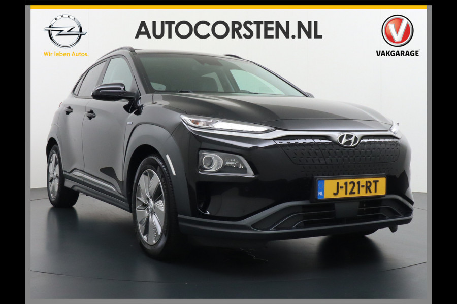 Hyundai Kona EV 64kWh 204pk Leer Schuif/Kanteldak 3 Fase laden Warmtepomp Apple Carplay Android Navi Camera Elektr.Stoelen+Verwarmd+Ventilati Pdc Elektr.Stoelen+Verwarmd+Ventilatie-koeling Subwoofer Bluetooth Dodehoek detector 1e Eigenaar Heerlijke, sterke FEV, Enorm Efficient en grote accu! 484km WLTP range