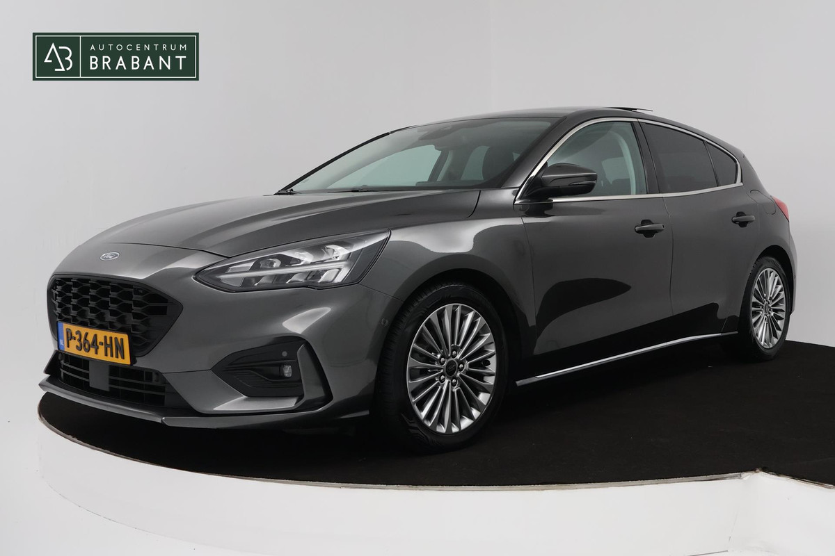 Ford Focus 1.0 EcoBoost Titanium Business (PANORAMADAK, TREKHAAK, ACHTERUITRIJCAMERA, STOEL/STUUR VERWARMING, SFEER) Ford Focus 1.0 EcoBoost Titanium Business (PANORAMADAK, TREKHAAK, ACHTERUITRIJCAMERA, STOEL/STUUR VERWARMING, SFEER)