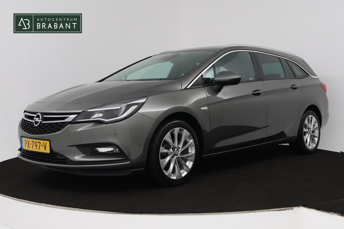 Opel Astra Sports Tourer 1.4 Innovation (PARKEERSENSOREN, TREKHAAK, CAMERA, STOELVERWARMING, CRUISE CONTROL) Opel Astra Sports Tourer 1.4 Innovation (PARKEERSENSOREN, TREKHAAK, CAMERA, STOELVERWARMING, CRUISE CONTROL)