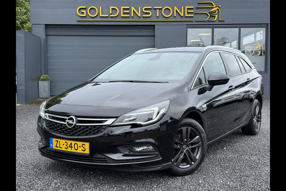 Opel Astra Sports Tourer 1.0 Turbo 120 Jaar Edition 1e Eigenaar,Navi,Clima,Cruise,Lm velgen,Pdc,Dealer Onderhouden,Apk tot 07-2027 Opel Astra Sports Tourer 1.0 Turbo 120 Jaar Edition 1e Eigenaar,Navi,Clima,Cruise,Lm velgen,Pdc,Dealer Onderhouden,Apk tot 07-2027