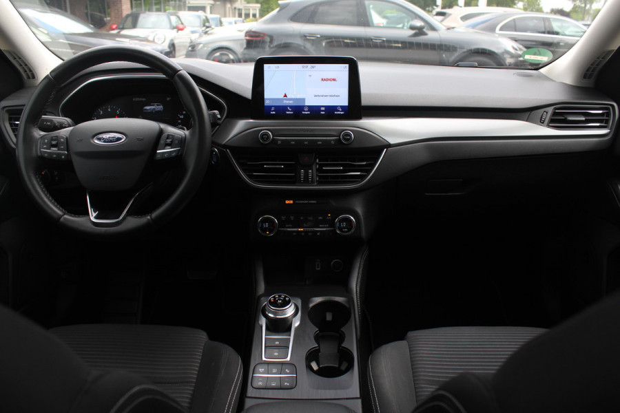 Ford FOCUS Wagon 1.0 EcoBoost Titanium Business / Trekhaak / Panoramadak / Camera / Head-up / B&O / 19'' / Keyless / Navigatie / Stuurverwarming / Dodehoek / DAB / Stoelverwarming / Cruise Control