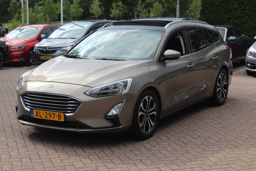 Ford FOCUS Wagon 1.0 EcoBoost Titanium Business / Trekhaak / Panoramadak / Camera / Head-up / B&O / 19'' / Keyless / Navigatie / Stuurverwarming / Dodehoek / DAB / Stoelverwarming / Cruise Control