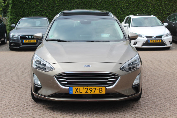 Ford FOCUS Wagon 1.0 EcoBoost Titanium Business / Trekhaak / Panoramadak / Camera / Head-up / B&O / 19'' / Keyless / Navigatie / Stuurverwarming / Dodehoek / DAB / Stoelverwarming / Cruise Control