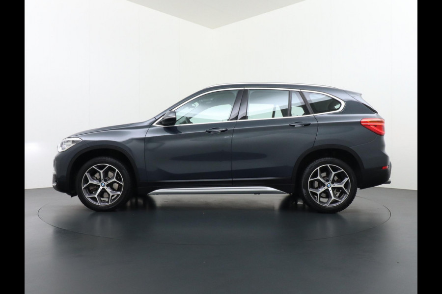 BMW X1 sDrive20i TREKHAAK | ELEK. KOFFER | LEDER | RIJKLAAR INCL. 12 MND. BOVAGGARANTIE
