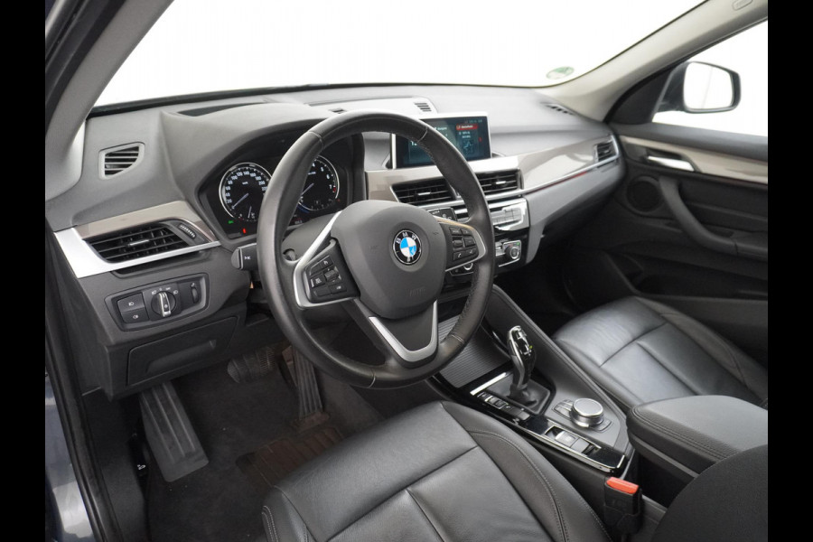 BMW X1 sDrive20i TREKHAAK | ELEK. KOFFER | LEDER | RIJKLAAR INCL. 12 MND. BOVAGGARANTIE