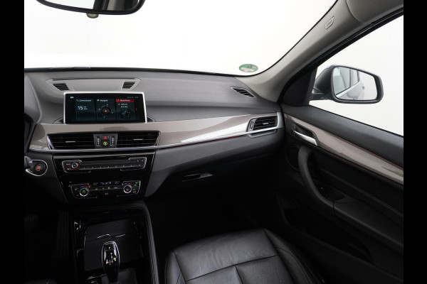 BMW X1 sDrive20i TREKHAAK | ELEK. KOFFER | LEDER | RIJKLAAR INCL. 12 MND. BOVAGGARANTIE