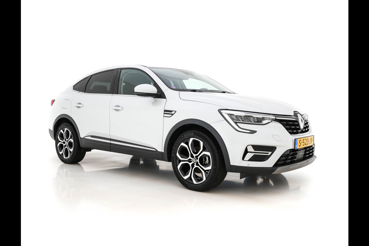 Renault Arkana 1.6 E-Tech hybrid 145 techno (INCL.BTW) *1/2LEATHER | FULL-LED | DIGI-COCKPIT | BLIND-SPOT | NAVI-FULLMAP | AMBIENT-LIGHT | CAMERA | KEYLESS | DAB+ | COMFORT-SEATS | 18''ALU* Renault Arkana 1.6 E-Tech hybrid 145 techno (INCL.BTW) *1/2LEATHER | FULL-LED | DIGI-COCKPIT | BLIND-SPOT | NAVI-FULLMAP | AMBIENT-LIGHT | CAMERA | KEYLESS | DAB+ | COMFORT-SEATS | 18''ALU*