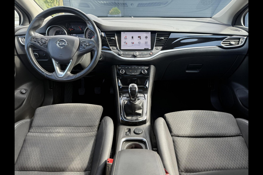 Opel Astra Sports Tourer 1.4 Innovation 2e Eigenaar,Navi,Camera,Trekhaak,150pk,Halfleder,6 Bak,Pdc V+A,Lm Velgen,Clima,Cruise,Nieuwe Apk bij Aflevering
