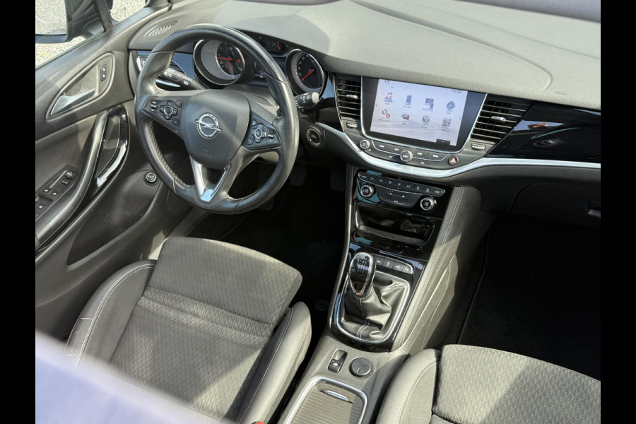 Opel Astra Sports Tourer 1.4 Innovation 2e Eigenaar,Navi,Camera,Trekhaak,150pk,Halfleder,6 Bak,Pdc V+A,Lm Velgen,Clima,Cruise,Nieuwe Apk bij Aflevering