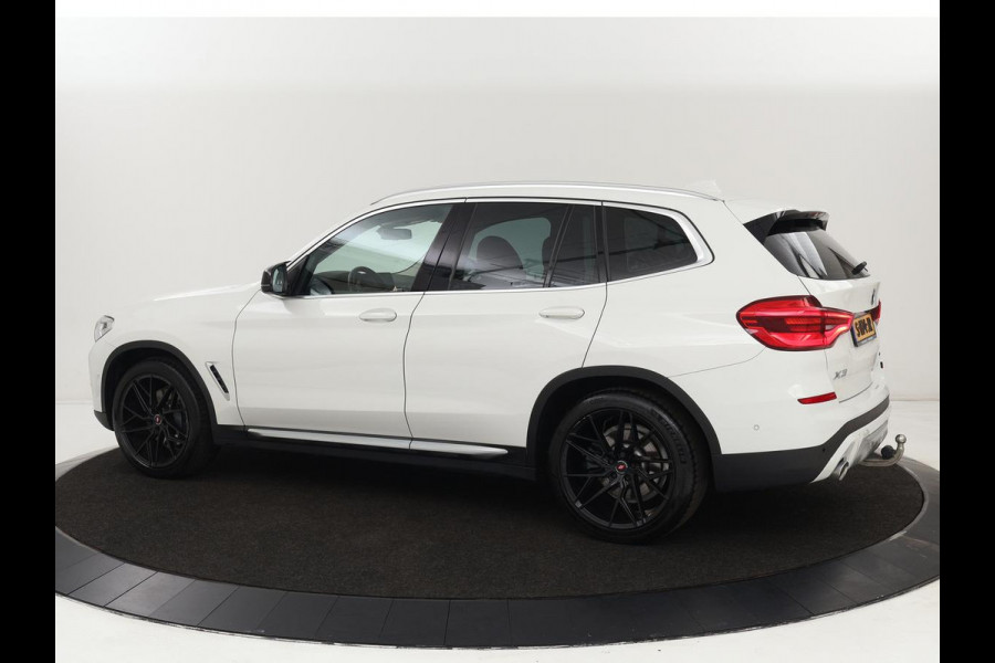 BMW X3 xDrive30i High Executive | Adaptive cruise | Head-Up | Leder | Carplay | Trekhaak | Camera | Stoelverwarming | Live Cockpit | 20'' lichtmetalen velgen | Keyless | Sportstoelen | Full LED | Navigatie