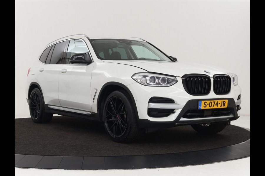 BMW X3 xDrive30i High Executive | Adaptive cruise | Head-Up | Leder | Carplay | Trekhaak | Camera | Stoelverwarming | Live Cockpit | 20'' lichtmetalen velgen | Keyless | Sportstoelen | Full LED | Navigatie