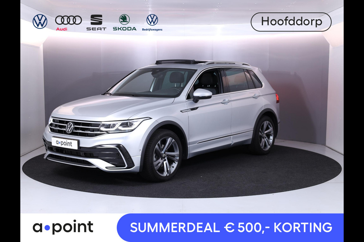 Volkswagen Tiguan 1.5 TSI R-Line Business 150 pk Automaat (DSG) | Verlengde garantie | Navigatie | Panoramadak | Elektr. trekhaak | Parkeersensoren (Park assist) | Achteruitrijcamera | R-Line | Volkswagen Tiguan 1.5 TSI R-Line Business 150 pk Automaat (DSG) | Verlengde garantie | Navigatie | Panoramadak | Elektr. trekhaak | Parkeersensoren (Park assist) | Achteruitrijcamera | R-Line |