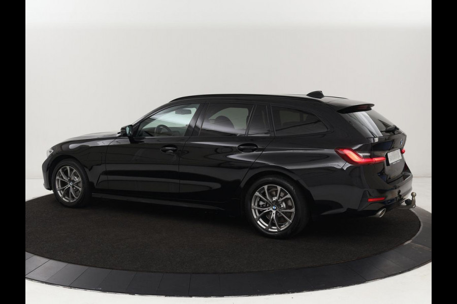 BMW 3-serie 330e Sport Line | Stoel & stuurverwarming | Adaptive cruise | Trekhaak | Sportstoelen | Carplay | Sfeerverlichting | Half leder | Navigatie | Full LED | PHEV