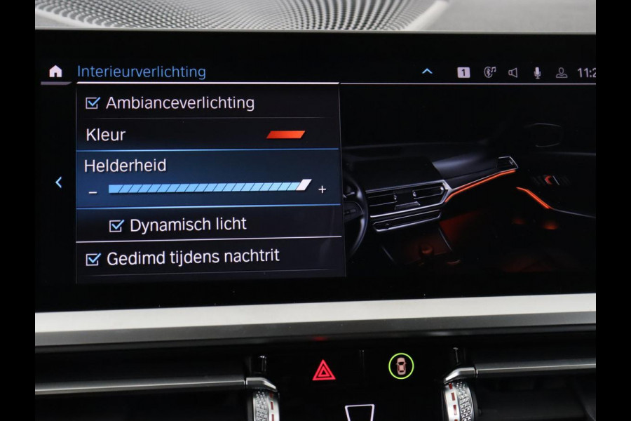BMW 3-serie 330e Sport Line | Stoel & stuurverwarming | Adaptive cruise | Trekhaak | Sportstoelen | Carplay | Sfeerverlichting | Half leder | Navigatie | Full LED | PHEV