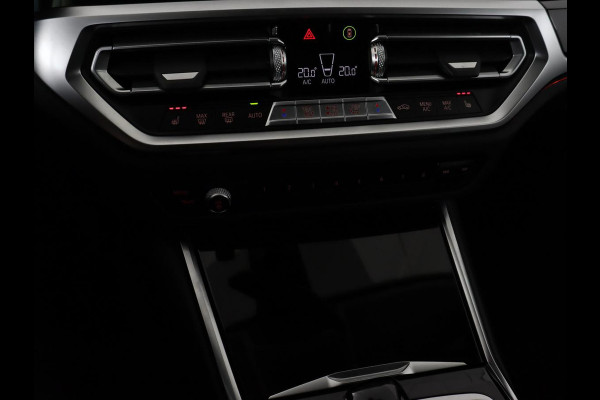 BMW 3-serie 330e Sport Line | Stoel & stuurverwarming | Adaptive cruise | Trekhaak | Sportstoelen | Carplay | Sfeerverlichting | Half leder | Navigatie | Full LED | PHEV