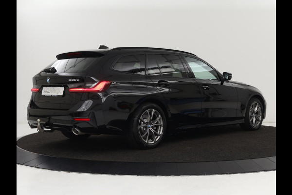 BMW 3-serie 330e Sport Line | Stoel & stuurverwarming | Adaptive cruise | Trekhaak | Sportstoelen | Carplay | Sfeerverlichting | Half leder | Navigatie | Full LED | PHEV