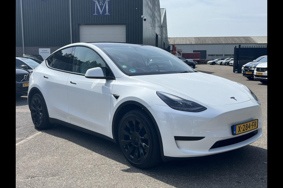 Tesla Model Y RWD 58 kWh AUTOPILOT | WIT LEDER | AFNEEMBARE TREKHAAK