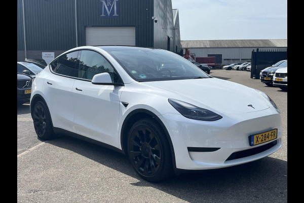 Tesla Model Y RWD 58 kWh AUTOPILOT | WIT LEDER | AFNEEMBARE TREKHAAK
