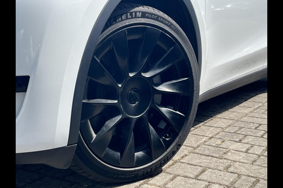 Tesla Model Y RWD 58 kWh AUTOPILOT | WIT LEDER | AFNEEMBARE TREKHAAK