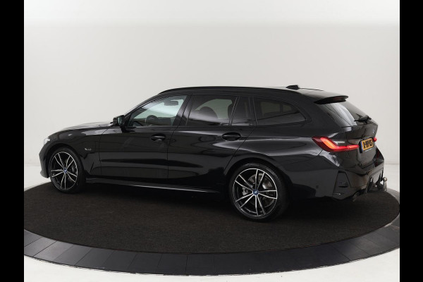 BMW 3-serie 320e M Sport | Head-Up | Adaptive cruise | Trekhaak | Leder | Stoelverwarming | Camera | Keyless | Adaptief LED | Carplay | Sfeerverlichting | Navigatie