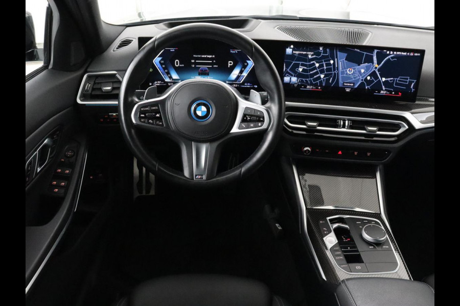 BMW 3-serie 320e M Sport | Head-Up | Adaptive cruise | Trekhaak | Leder | Stoelverwarming | Camera | Keyless | Adaptief LED | Carplay | Sfeerverlichting | Navigatie