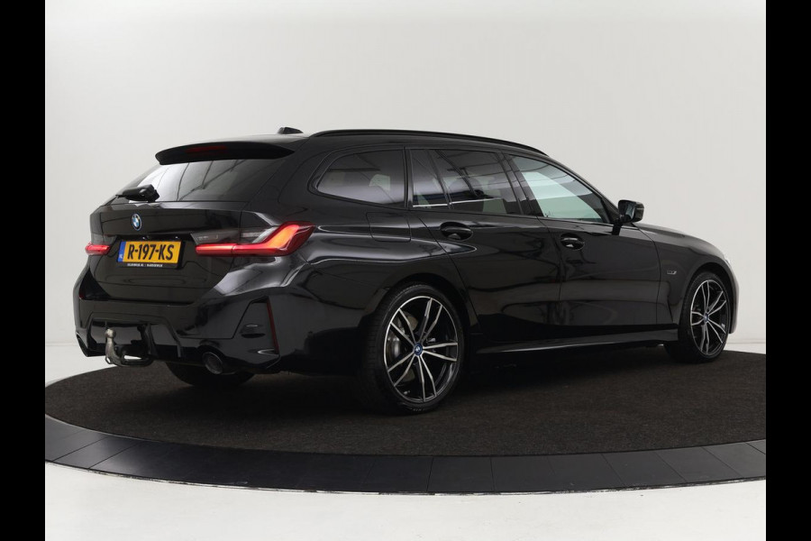 BMW 3-serie 320e M Sport | Head-Up | Adaptive cruise | Trekhaak | Leder | Stoelverwarming | Camera | Keyless | Adaptief LED | Carplay | Sfeerverlichting | Navigatie