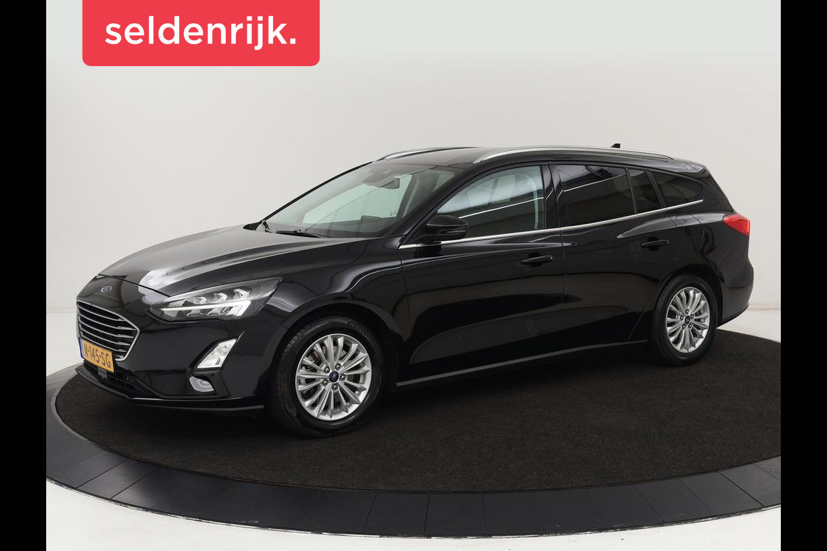 Ford Focus 1.0 EcoBoost Titanium X | Stoel & stuurverwarming | Trekhaak | Adaptive cruise | Camera | Full LED | Carplay | B&O Sound | Digital Cockpit | Keyless | Climate control Ford Focus 1.0 EcoBoost Titanium X | Stoel & stuurverwarming | Trekhaak | Adaptive cruise | Camera | Full LED | Carplay | B&O Sound | Digital Cockpit | Keyless | Climate control