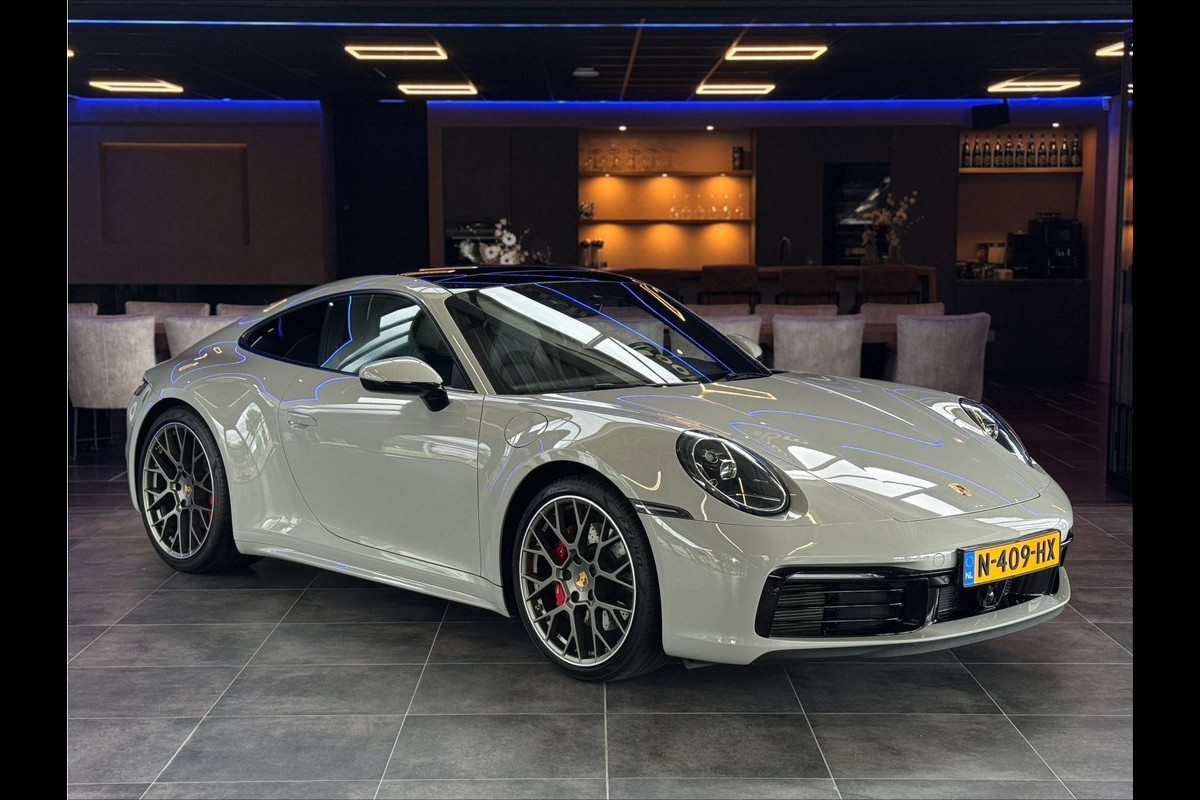 Porsche 911 3.0 Carrera 4S Sport chrono Bose Dealer onderhouden Kreide Grau Panoramadak ACC 450PK! Porsche 911 3.0 Carrera 4S Sport chrono Bose Dealer onderhouden Kreide Grau Panoramadak ACC 450PK!