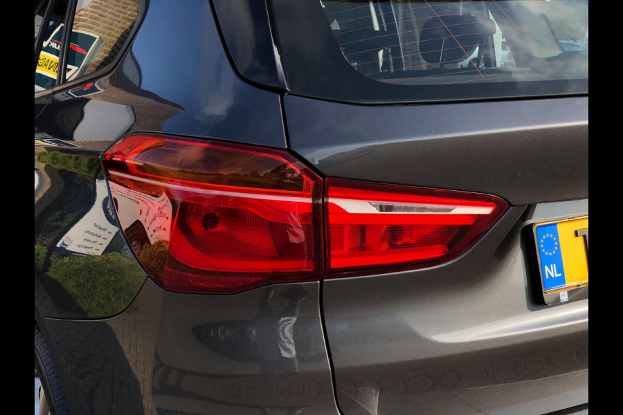 BMW X1 SDrive18i High Executive | Navi, Cruise, PDC, Stoelverw, El. Achterklep | Dealeronderhouden |