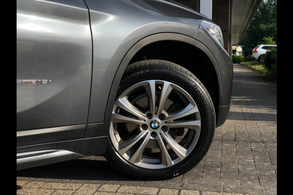 BMW X1 SDrive18i High Executive | Navi, Cruise, PDC, Stoelverw, El. Achterklep | Dealeronderhouden |