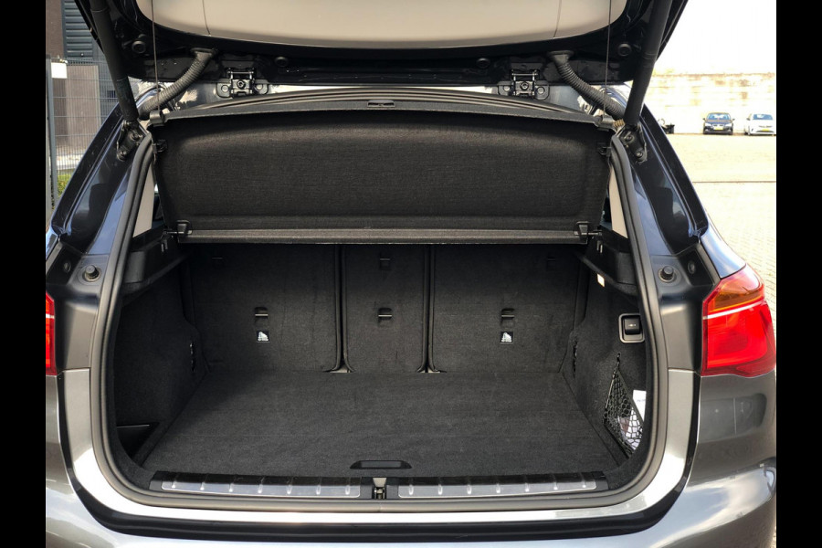 BMW X1 SDrive18i High Executive | Navi, Cruise, PDC, Stoelverw, El. Achterklep | Dealeronderhouden |