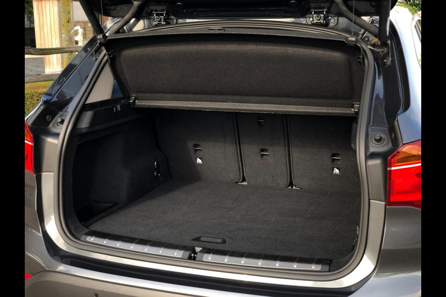 BMW X1 SDrive18i High Executive | Navi, Cruise, PDC, Stoelverw, El. Achterklep | Dealeronderhouden |
