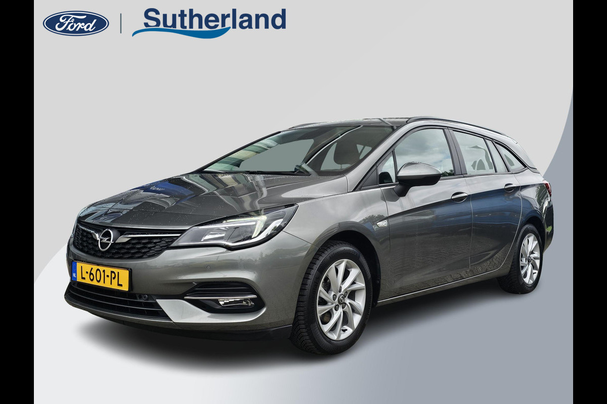 Opel Astra Sports Tourer 1.2 Edition Zeer netjes | Trekhaak | Climate control | Navigatie | App connect | Camera | Dealeronderhouden Opel Astra Sports Tourer 1.2 Edition Zeer netjes | Trekhaak | Climate control | Navigatie | App connect | Camera | Dealeronderhouden