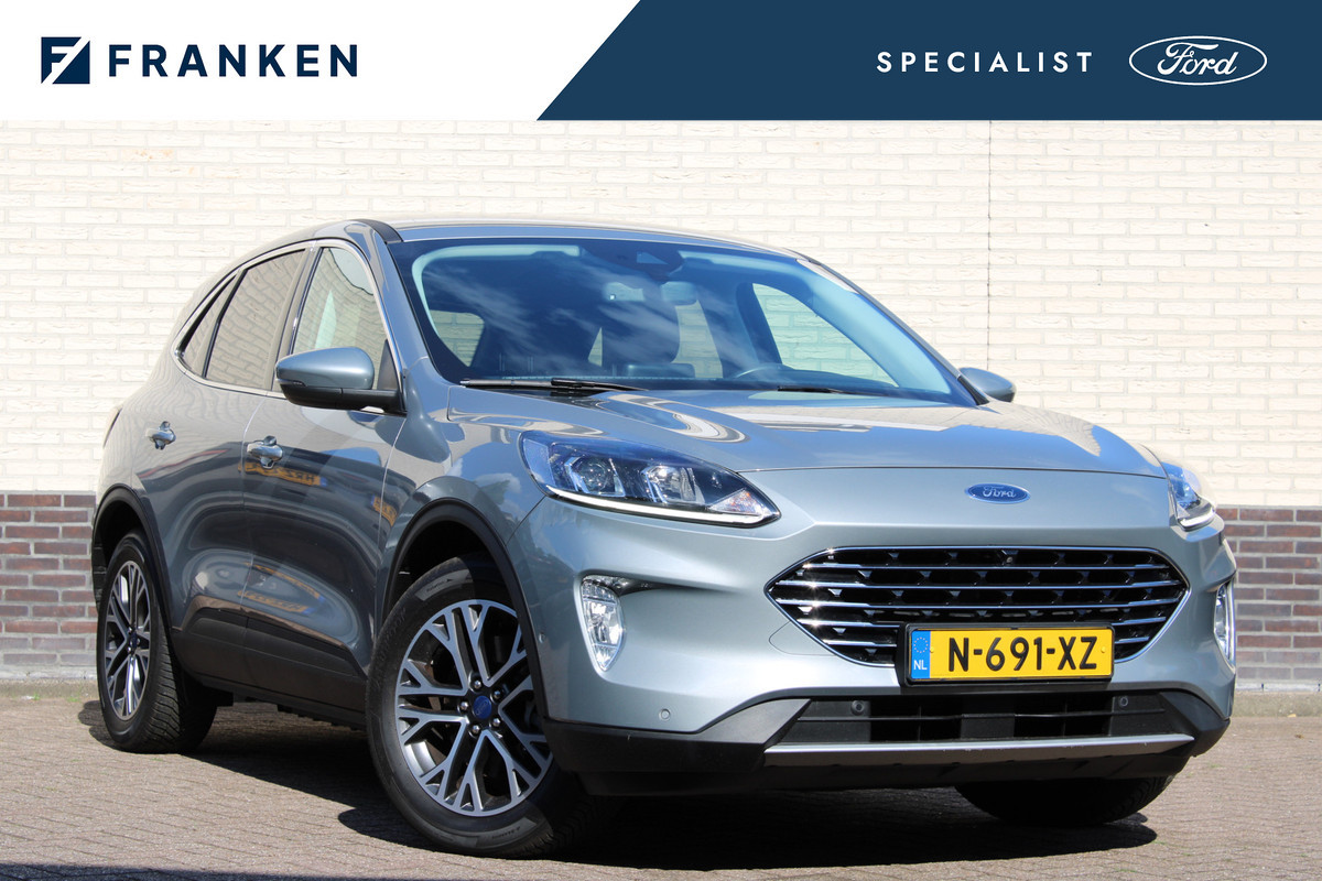 Ford Kuga 2.5 PHEV Titanium | Winterpack | Adaptive cruise | Camera Ford Kuga 2.5 PHEV Titanium | Winterpack | Adaptive cruise | Camera
