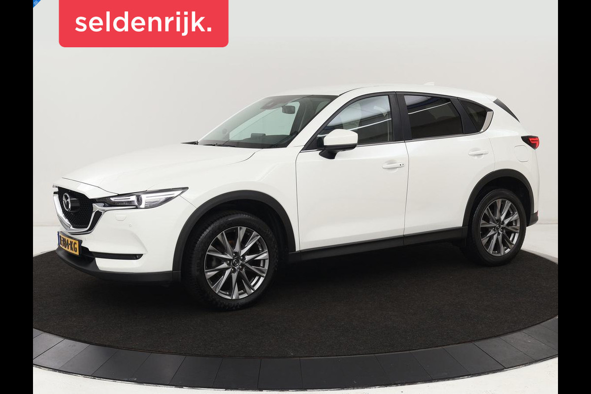 Mazda CX-5 2.0 SkyActiv-G 165 Style Selected | Trekhaak | Leder | Stoel & stuurverwarming | Head-Up | 360 Camera | BOSE Sound | Memory | Carplay | Full LED Mazda CX-5 2.0 SkyActiv-G 165 Style Selected | Trekhaak | Leder | Stoel & stuurverwarming | Head-Up | 360 Camera | BOSE Sound | Memory | Carplay | Full LED