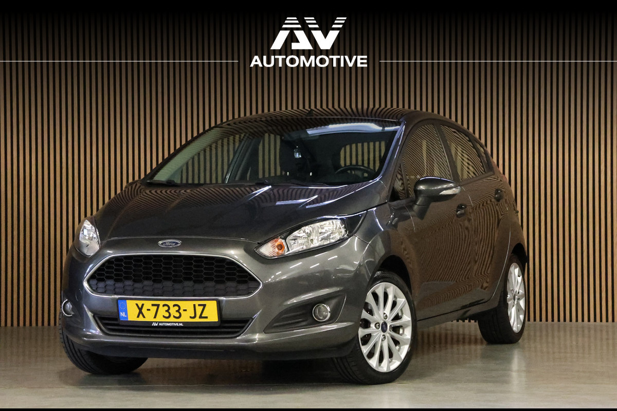 Ford Fiesta 1.25 Titanium | Airco | Stoelverwarming | Parkeersensoren | Multifunctioneel stuurwiel | Multimedia | Mistlampen | Elektrisch inklapbare spiegels | Elektrische ramen | Nieuwe APK | Nette staat Ford Fiesta 1.25 Titanium | Airco | Stoelverwarming | Parkeersensoren | Multifunctioneel stuurwiel | Multimedia | Mistlampen | Elektrisch inklapbare spiegels | Elektrische ramen | Nieuwe APK | Nette staat