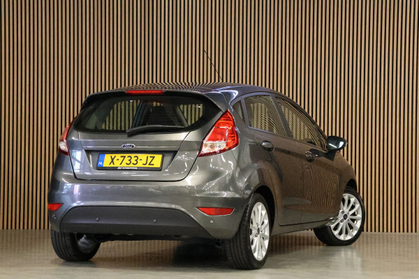 Ford Fiesta 1.25 Titanium | Airco | Stoelverwarming | Parkeersensoren | Multifunctioneel stuurwiel | Multimedia | Mistlampen | Elektrisch inklapbare spiegels | Elektrische ramen | Nieuwe APK | Nette staat