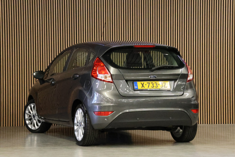 Ford Fiesta 1.25 Titanium | Airco | Stoelverwarming | Parkeersensoren | Multifunctioneel stuurwiel | Multimedia | Mistlampen | Elektrisch inklapbare spiegels | Elektrische ramen | Nieuwe APK | Nette staat