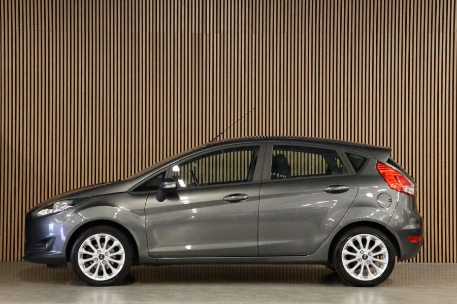 Ford Fiesta 1.25 Titanium | Airco | Stoelverwarming | Parkeersensoren | Multifunctioneel stuurwiel | Multimedia | Mistlampen | Elektrisch inklapbare spiegels | Elektrische ramen | Nieuwe APK | Nette staat
