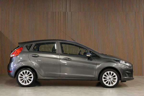 Ford Fiesta 1.25 Titanium | Airco | Stoelverwarming | Parkeersensoren | Multifunctioneel stuurwiel | Multimedia | Mistlampen | Elektrisch inklapbare spiegels | Elektrische ramen | Nieuwe APK | Nette staat