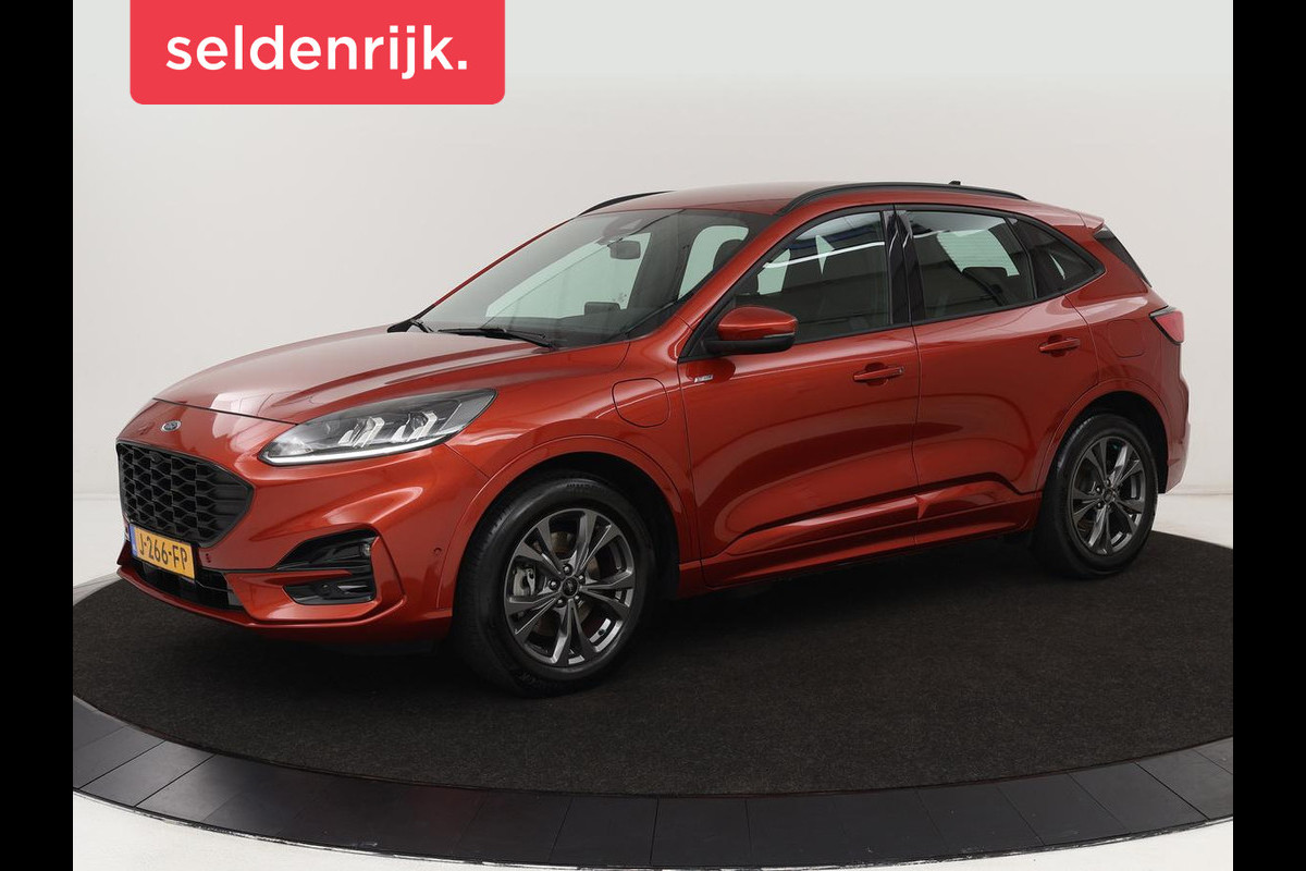 Ford Kuga 2.5 PHEV ST-Line | Trekhaak | Adaptive cruise | Camera | Carplay | Navigatie | Keyless | Full LED | Climate control Ford Kuga 2.5 PHEV ST-Line | Trekhaak | Adaptive cruise | Camera | Carplay | Navigatie | Keyless | Full LED | Climate control