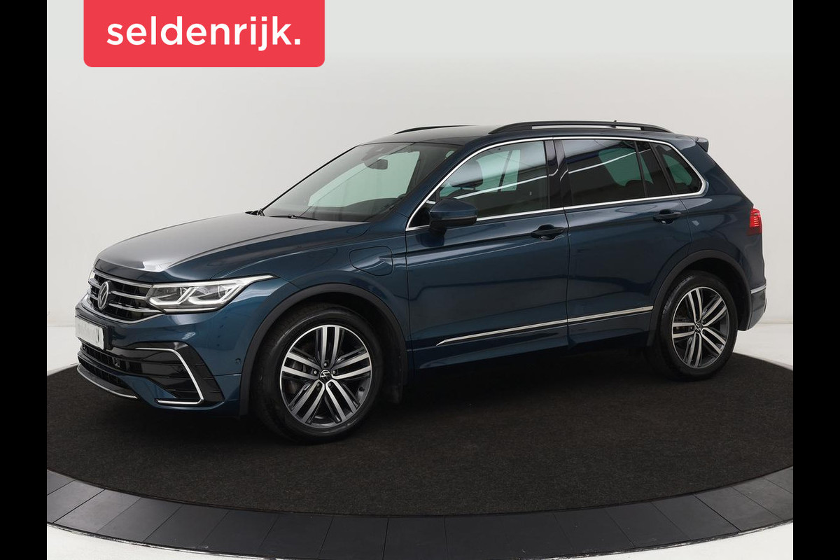 Volkswagen Tiguan 1.4 TSI eHybrid R-Line | Stoelverwarming | Trekhaak | Camera | Adaptive cruise | Stuurverwarming | Matrix LED | Carplay | Virtual Cockpit | Navigatie | PHEV Volkswagen Tiguan 1.4 TSI eHybrid R-Line | Stoelverwarming | Trekhaak | Camera | Adaptive cruise | Stuurverwarming | Matrix LED | Carplay | Virtual Cockpit | Navigatie | PHEV