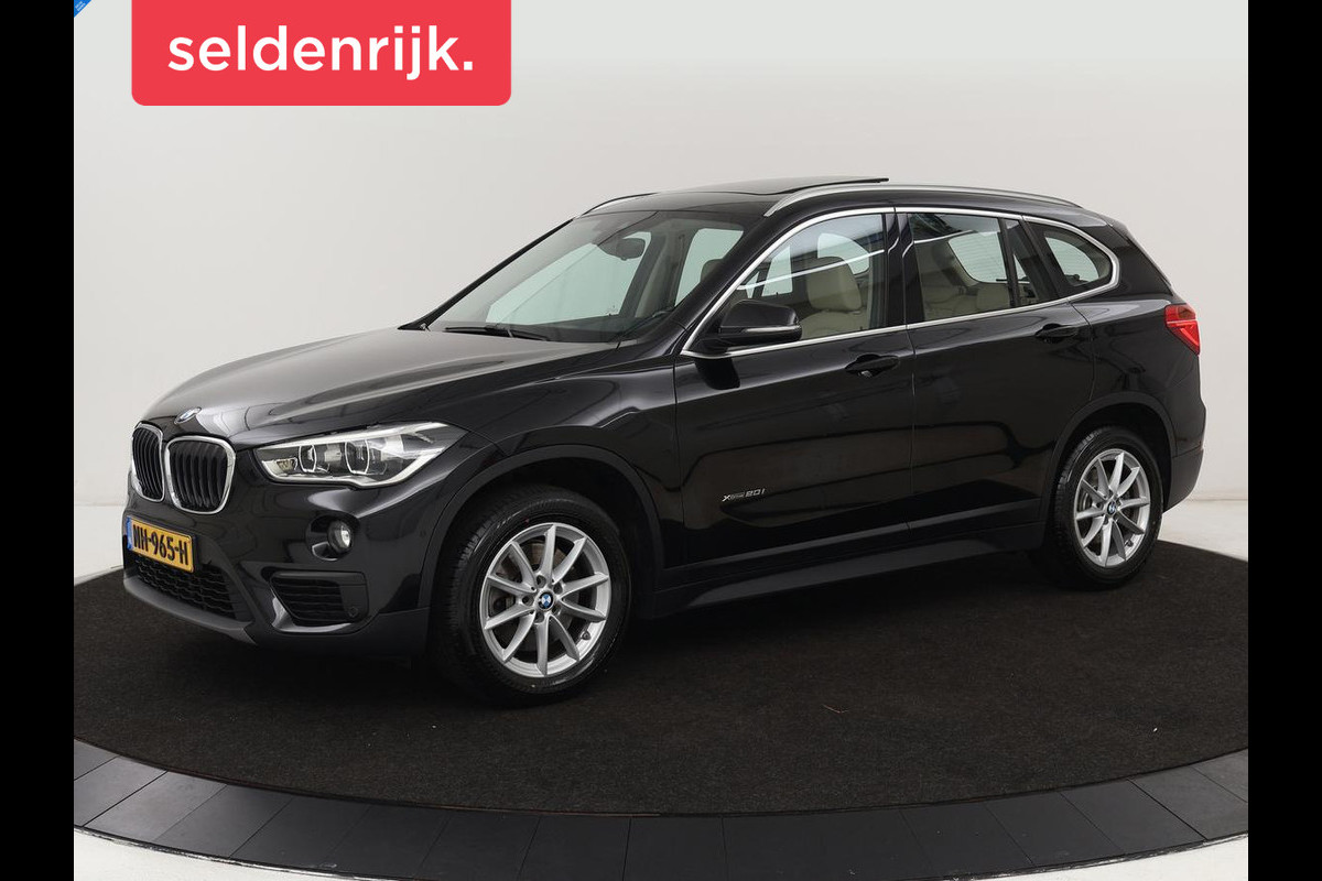 BMW X1 xDrive20i High Executive | Panoramadak | Leder | Stoel & stuurverwarming | Trekhaak | Park Assist | DAB | Navigatie | Full LED | Sportstoelen BMW X1 xDrive20i High Executive | Panoramadak | Leder | Stoel & stuurverwarming | Trekhaak | Park Assist | DAB | Navigatie | Full LED | Sportstoelen